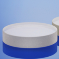 SCHOTT i-Line glass discs combine high refractive index homogeneity and high UV transmittance Two clear i-Line glass discs made by SCHOTT on a blue background