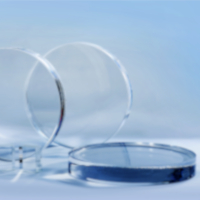 High homogeneity glass by SCHOTT enable extremely high resolution imaging Two clear high homogeneity glass discs made by SCHOTT for high-power lasers and satellite technology