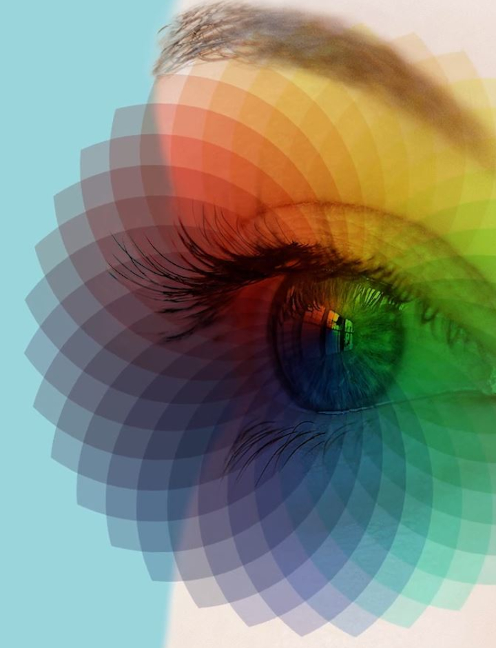 Illustration of a female eye overlaid with color spectrum